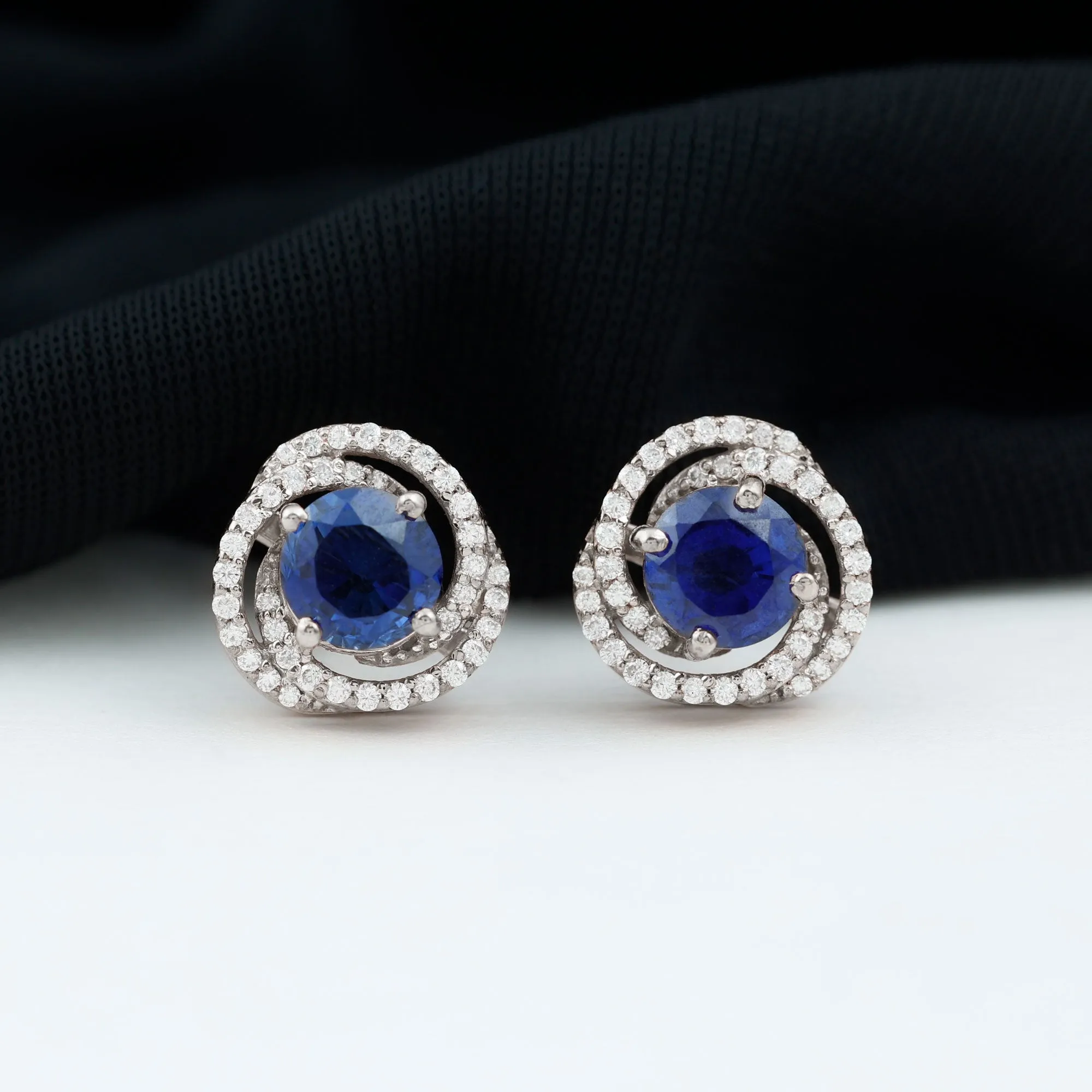 2.50 CT Created Blue Sapphire and Diamond Swirl Stud Earrings