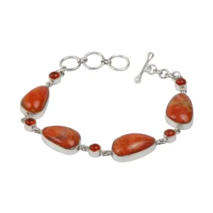 An Elegant Design with 4 Beautiful Sponge Corals set in a Sterling Silver Bracelet and Accented with Small Round Carnalian Gems