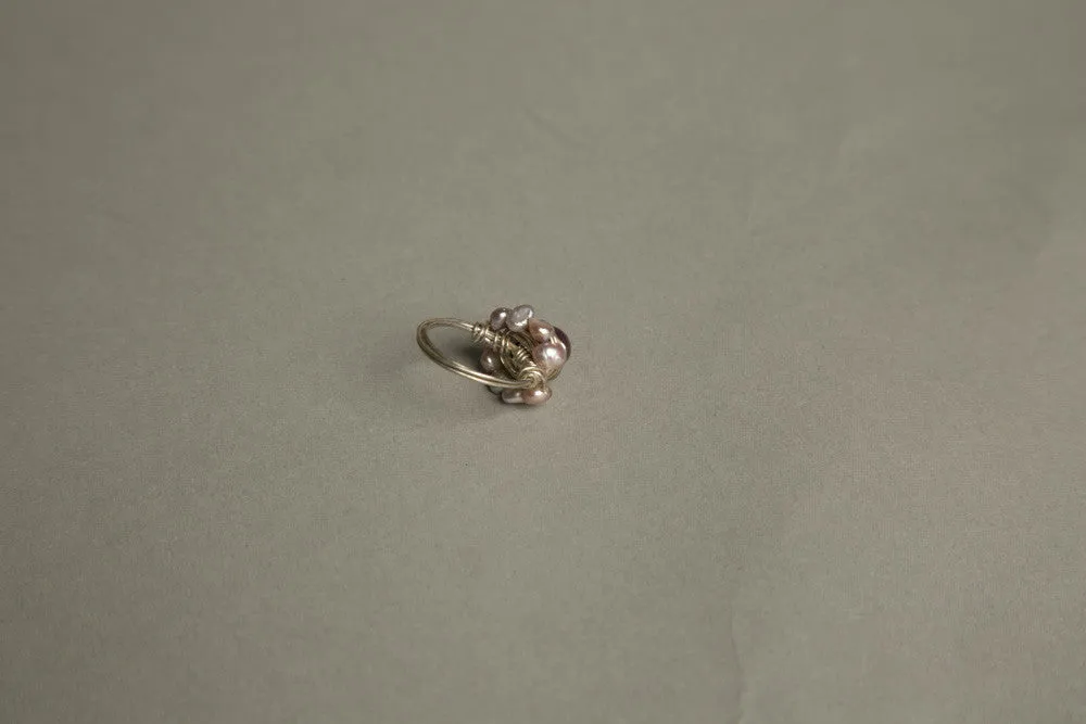 Bold Yet Dainty: Artistic Pearl Cocktail Ring with a Twist
