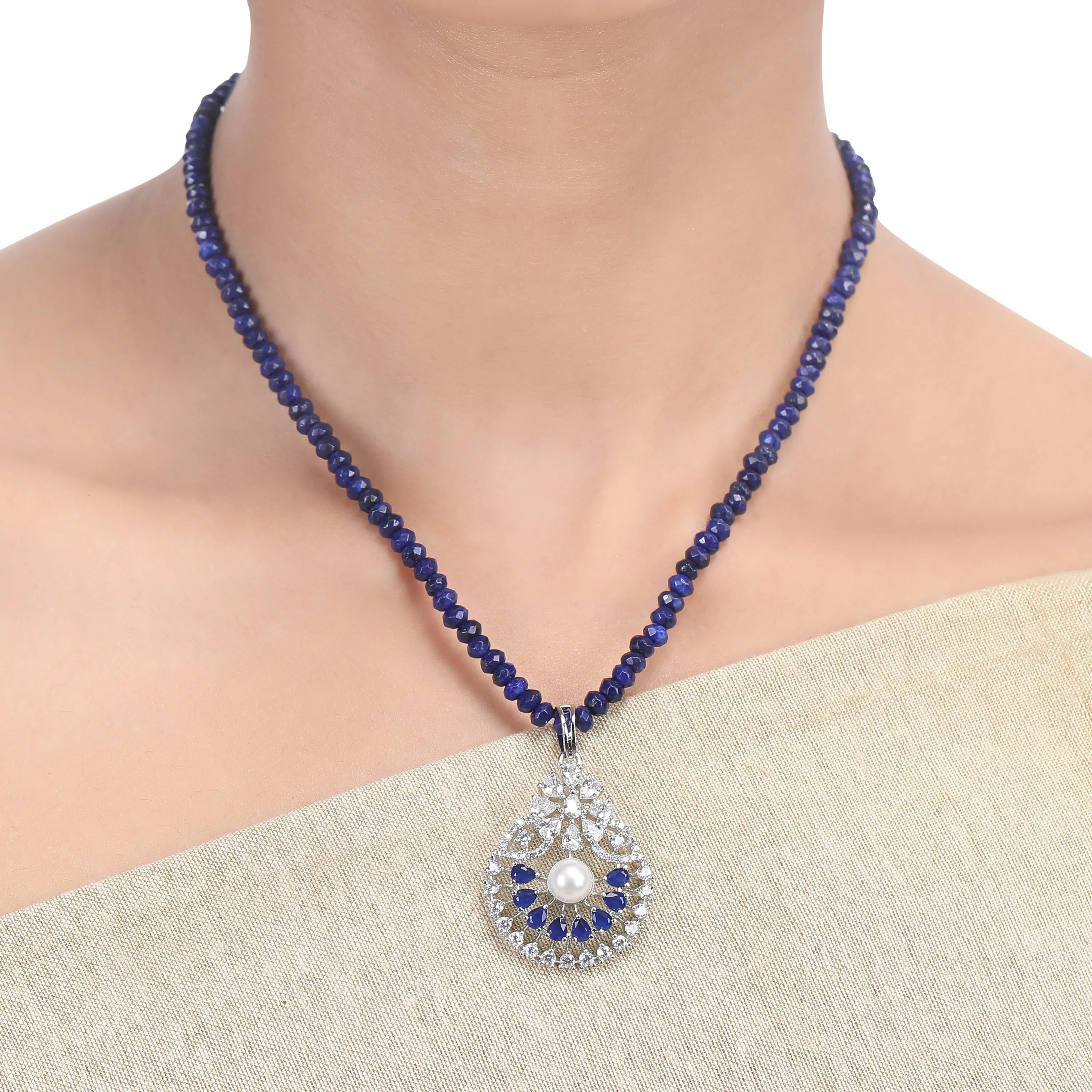Karuna Naarathi Zircon Pendant set