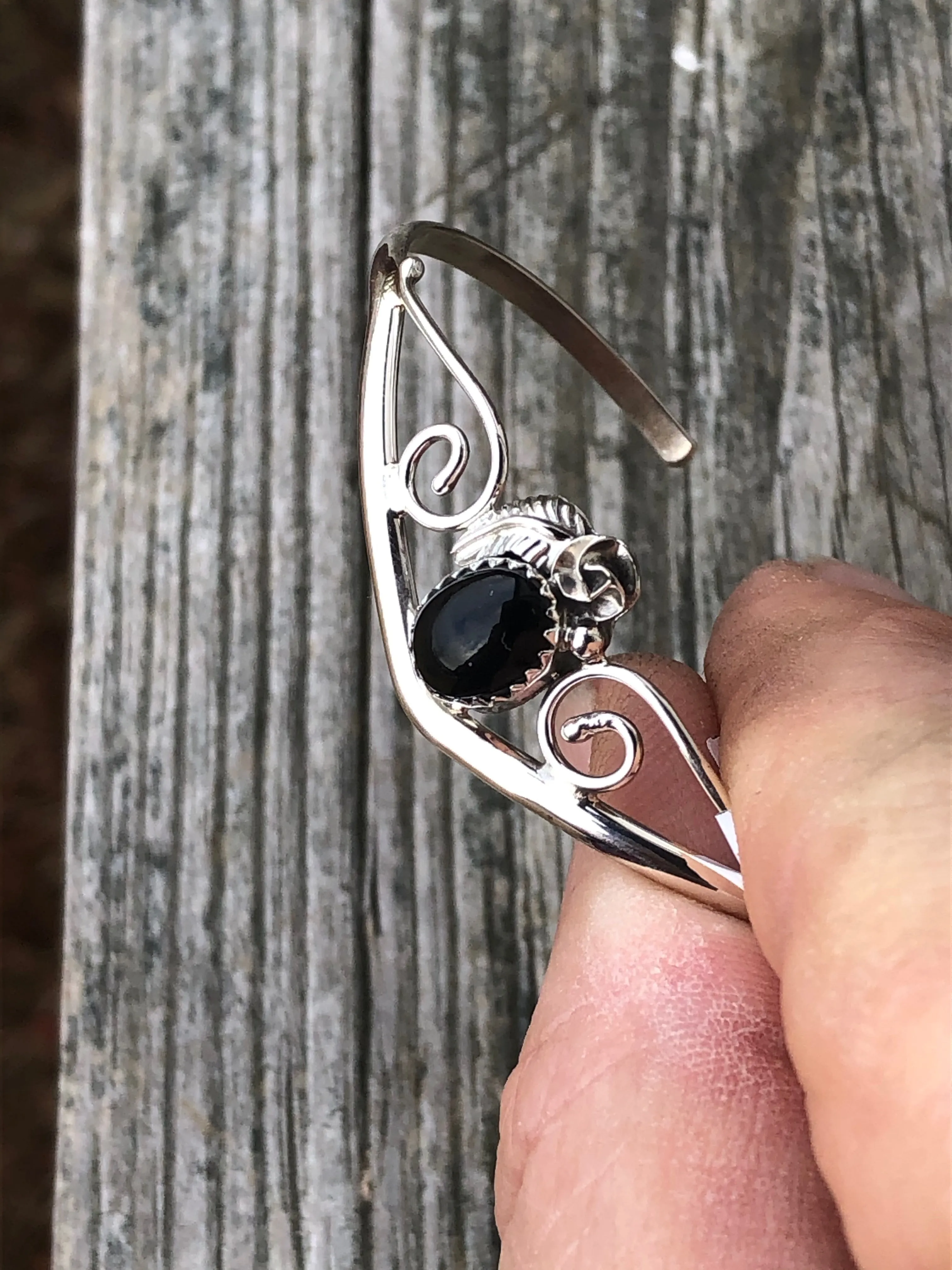 Navajo onyx and sterling silver leaf flower swirl bracelet