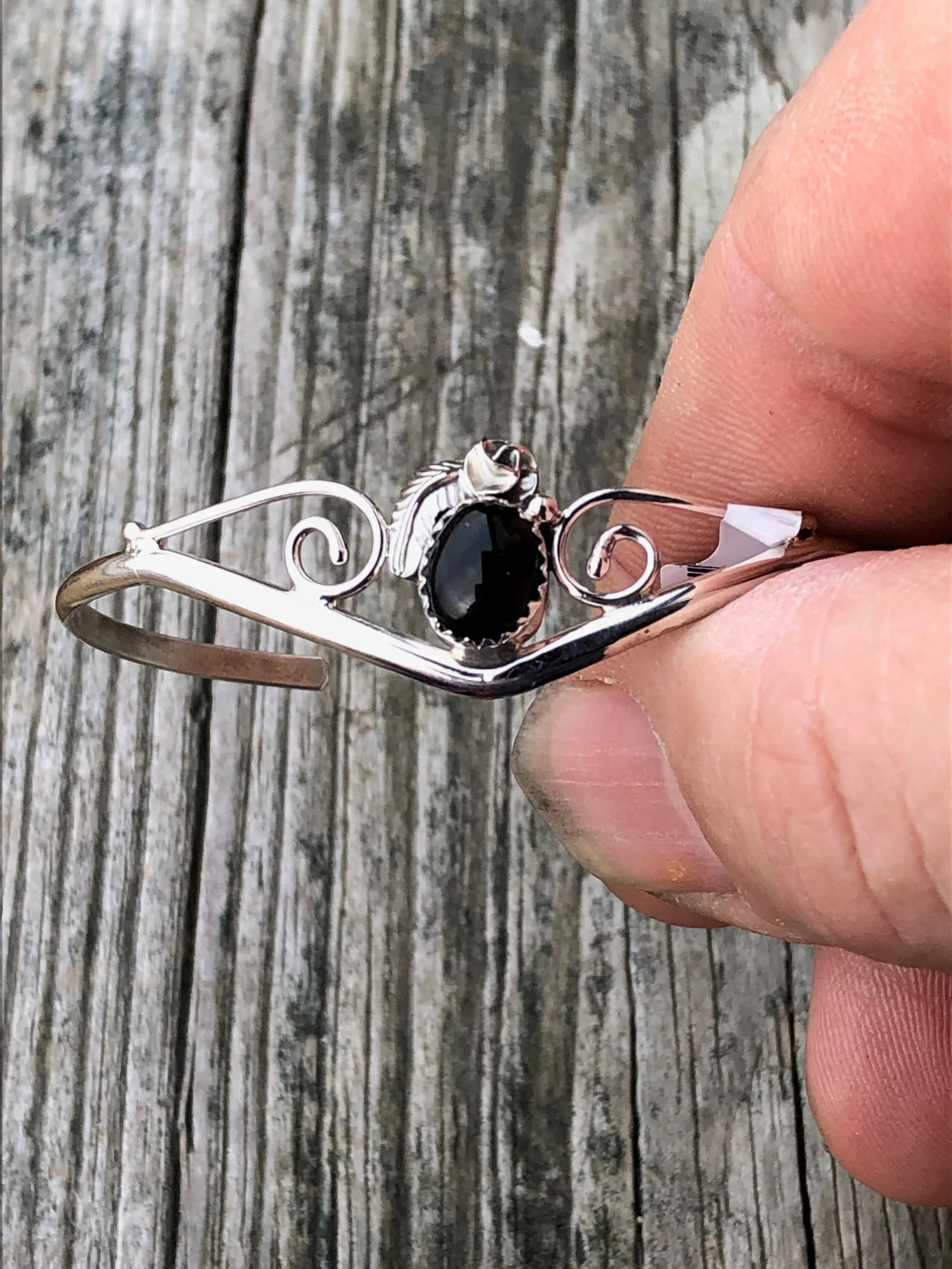 Navajo onyx and sterling silver leaf flower swirl bracelet