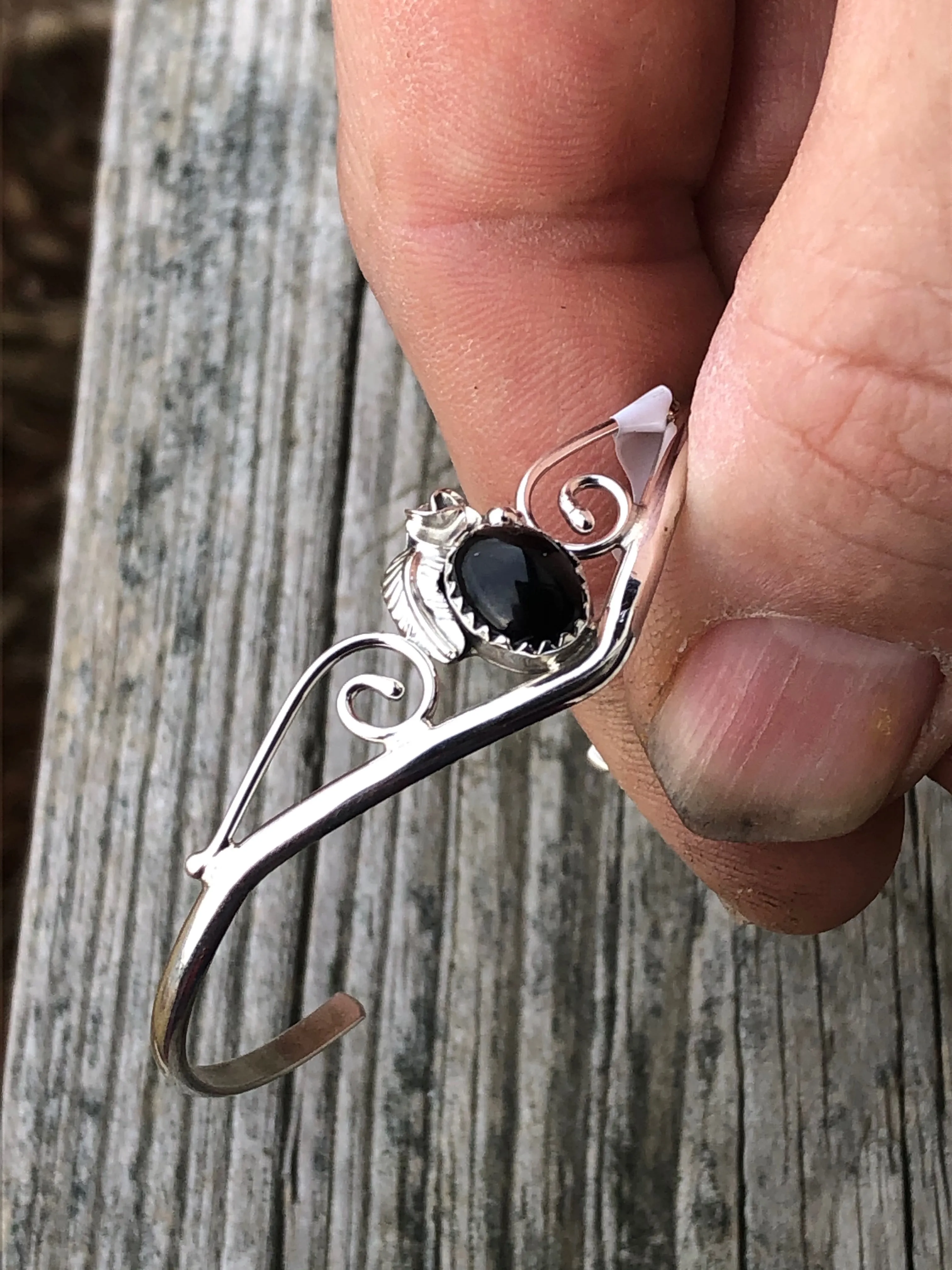 Navajo onyx and sterling silver leaf flower swirl bracelet