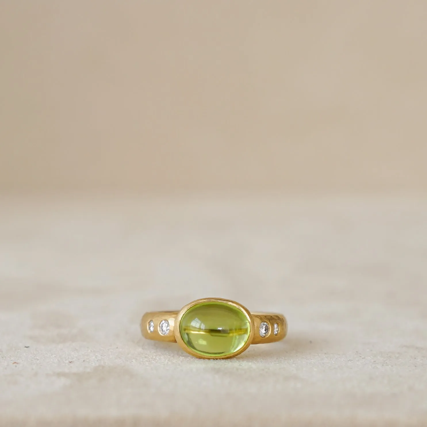Peridot Cabochon Ring with Diamond Band