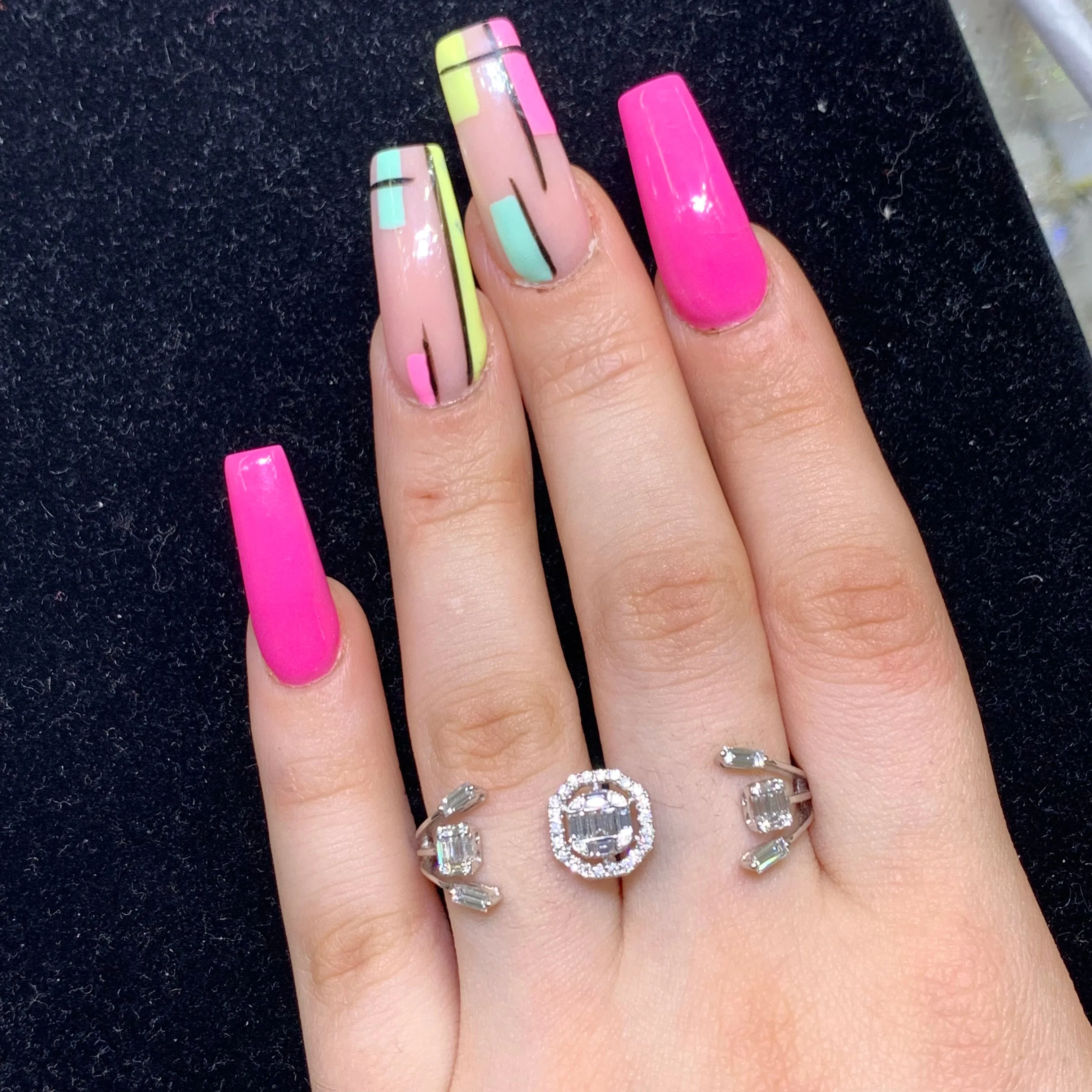 VVS/vs high clarity diamonds set in a 18k White Gold and Diamond Octagon Ladies' Two-Finger Ring (VVS diamonds)